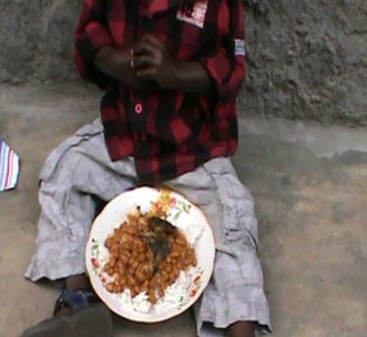 Small child in Democratic Republic of Congo | NFDPC | Donation | Food and clothes
